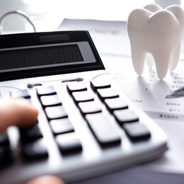 a person breaking down the cost of invisalign