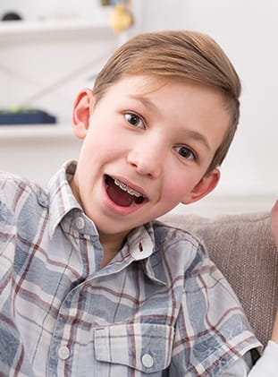 Young boy with braces