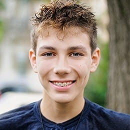 Teen boy with braces