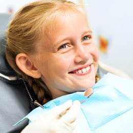 young girl at dentist