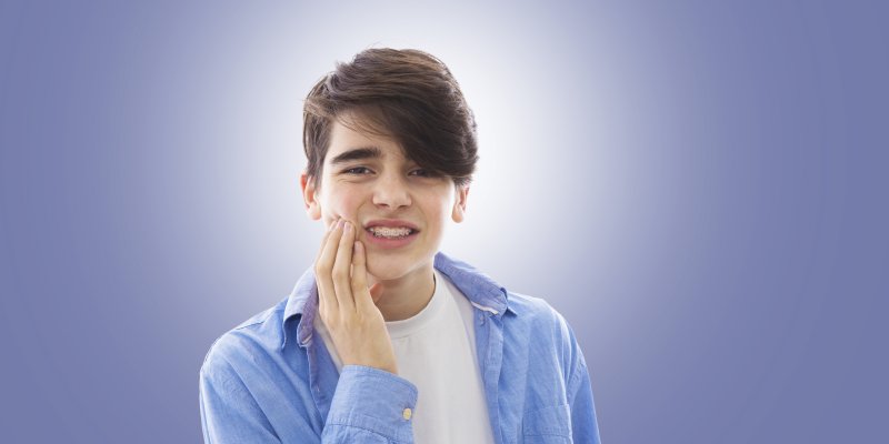 Teen with sore braces